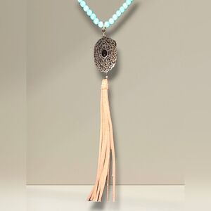 Long turquoise bead necklace Southwestern metal filigree pendant / tassel